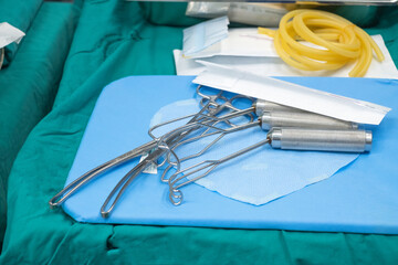 Sterile scissors and other medical instruments. Surgical equipment and medical devices in operating room. Sterile scissors and other medical instruments.