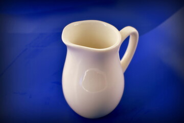 white jug on blue