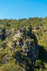 Obraz premium Hiking route in a town in the province of Valencia, nature on a sunny day.