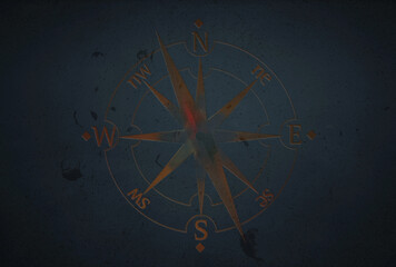 Fototapeta na wymiar compass on black wall background
