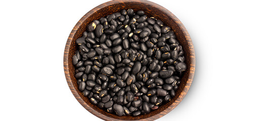 Black beans in wooden bowl on white background, top view, copy space