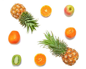 Creative mockup of oranges, tangerines, kiwi, apple and pineapple on a white isolated background. Food concept. Healthy eating. View from above.