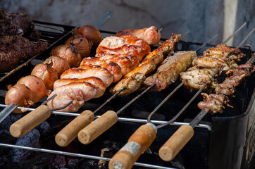 close up on a barbecue grill full of meat and onions, brazilian style