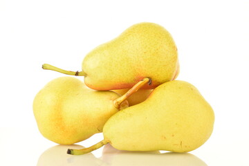 Several ripe yellow pears, close-up, isolated on white.