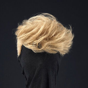 Blonde Wig With Short Hair Isolated On Black Background