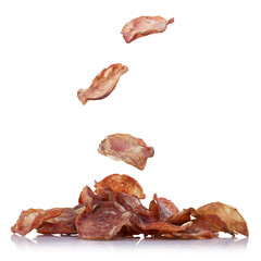 Falling flying meat chips isolated on white background. A serving of meat chips.