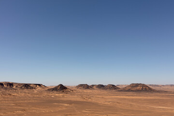 Fototapeta na wymiar Gentle blue sky over the Black Desert.