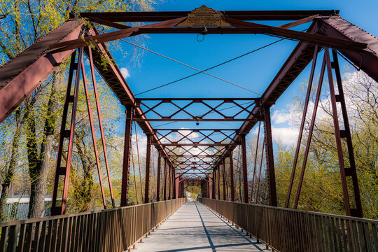 An old steel bridge built in the early 1900s is now a safe footpath across the Boise River near Boise State University in Boise, Idaho.