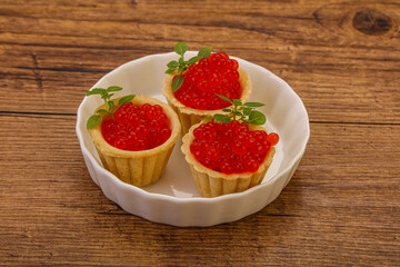 Apetizer - tartlet with red caviar