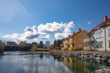 Fototapeta na wymiar City walk and spring in the air, with white clouds - Here residential area Brønnøysund,Helgeland,Nordland county,Norway,scandinavia,Europe