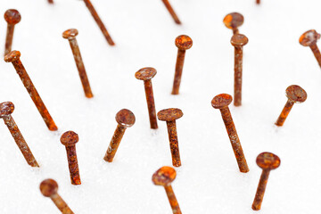 Old nails head set, Rusty nail from different perspectives on a white background.