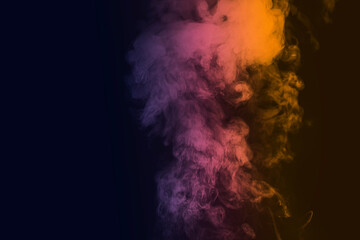 Beautiful colored smoke in the dark room