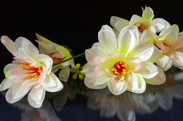 Obraz na płótnie Canvas Artificial flowers.Beautiful and bright background close-up.
