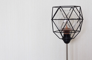 Vintage lamp with metal black forged lampshade on white background ,Place for text