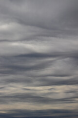 clouds in the sky that look like cotton curtains