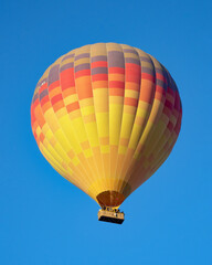 Naklejka premium Colorful Hot Air Balloon Flying Over Göreme, Cappadocia 