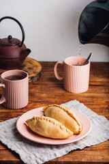 Two Cabbage Hand Pies on Plate