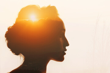 Woman with sunset and clouds beyond her head. Self-restraint and self-improvement concept. - obrazy, fototapety, plakaty