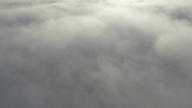 The concept of meteorology and forecasting of weather changes. Gray storm clouds gathered over the ground. Air saturated with ozone before a thunderstorm. High quality. 4k footage.