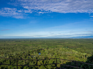 Beautiful top of view of the green forest, and blue sky in Phu Sing mountain Country park in Bungkan province, Thailand.