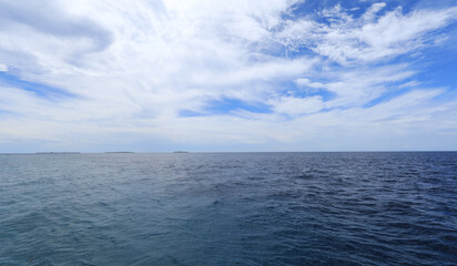 paradise idyllic seascape in the Indian Ocean, turquoise water and blue sky