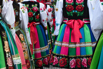 Women dressed in polish national folk costumes from Lowicz during annual Corpus Christi procession....
