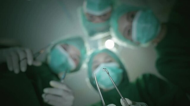medical team is helping patients in the operating room in a hospital or clinic. blur motion
