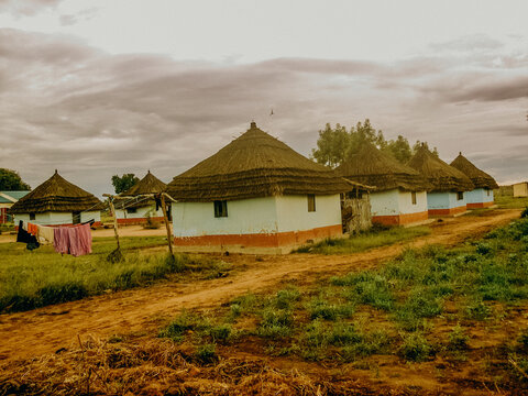 Row of homes and clothesline in South Sudan countryside