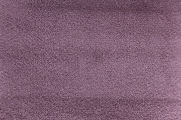 Plum colour velour textile sample. Fabric texture background