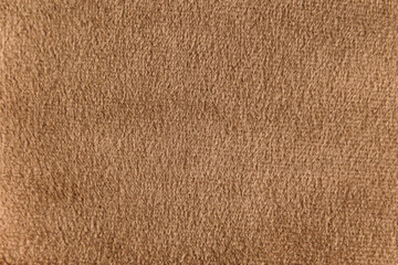 Brown colour velour textile sample. Fabric texture background