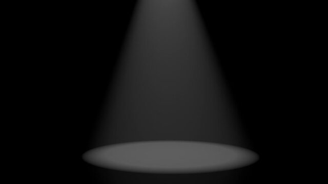 A searchlight beam falls from above in the dark and searches for something on the black floor. Seamless loop.