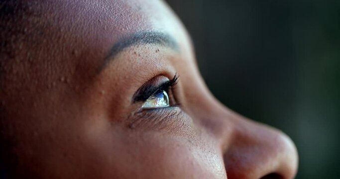 African person eyes looking at sky with HOPE and FAITH, spiritual happiness
