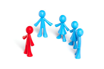 . Toy people Isolated on white background. The red man stands apart from the group. Asociality,...