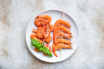 shrimp kebab on skewer prawns seafood snack meal diet vegetarian food copy space food background rustic. top view 