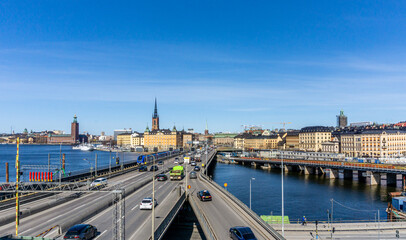 Fototapeta na wymiar Panoramic view of old town in Stockholm, daylight and traffic