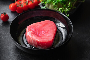tuna fresh fish raw seafood ready to eat meal snack copy space food background rustic. top view...