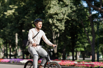 Businessman in park and active sports lifestyle in city