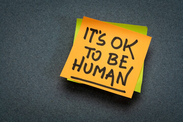 it is OK to be human - inspirational reminder note, emotions, vulnerability and personal development concept