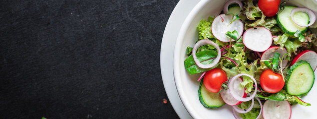vegetables salad radish, cucumber, mix leaves petals meal snack keto or paleo diet vegan or vegetarian food copy space food background rustic. top view