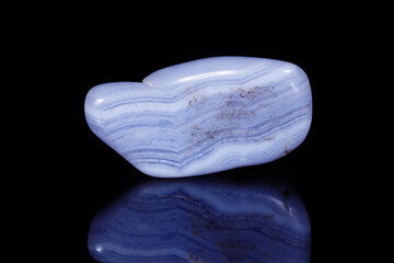 Macro mineral blue agate sapphirin in the rock on black background