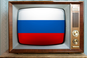 old tube vintage TV with the national flag of Russia on the screen, the concept of eternal values...