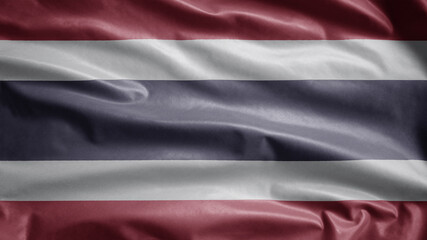 Thai flag waving in the wind. Close up of Thailand banner blowing soft silk.
