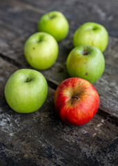 Green apples and red apple