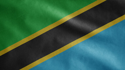 Tanzanian flag waving in the wind. Close up of Tanzania banner blowing soft silk
