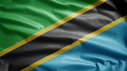 Tanzanian flag waving in the wind. Tanzania banner blowing soft silk.