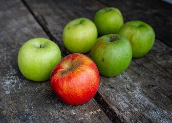 Green apples and red apple