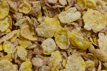 Dry cereal whole grains, granola and oat flakes breakfast concept background image.