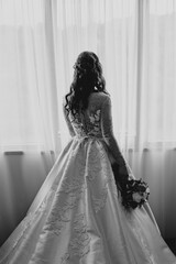 Fototapeta premium bride and groom holding hands wedding day ring bouquet with flowers in white wedding dress 