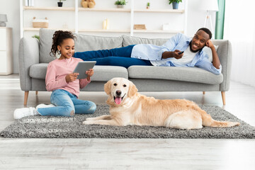 Black family spending time together at home