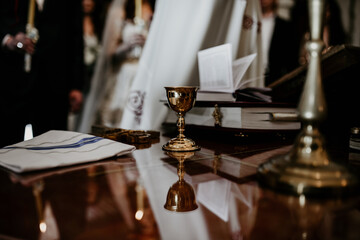 church wedding ceremony bride and groom holding candle	

